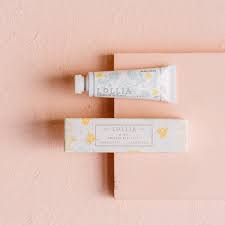Travel-size Wish handcream by Lollia: Macadamia Nut & Avocado Oils, Aloe extracts, Shea Butter for long-lasting comfort. Floral scent of Warm Vanilla Bean & Rice Flower with Sugared Pastille.