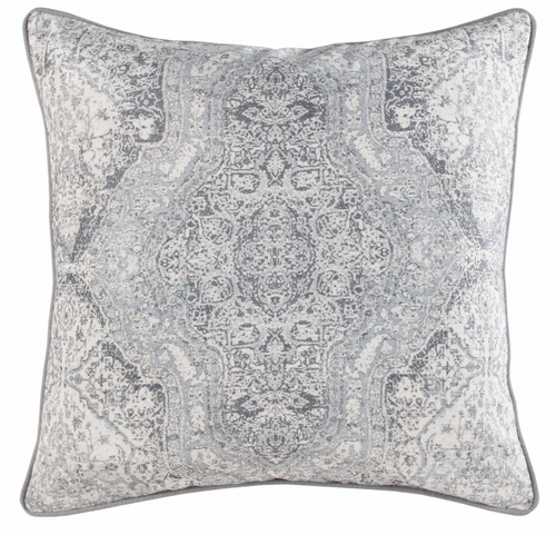 Soft gray pillow with intricate pattern, adding elegance to any space.