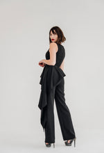Load image into Gallery viewer, V-Neck Peplum Jumpsuit by Posh Couture: A stylish, sleeveless jumpsuit featuring a flattering v-neckline and a peplum detail at the waist.
