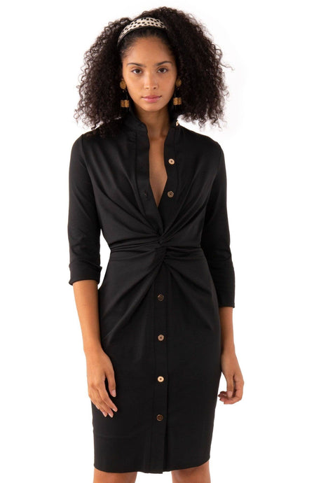 Sleek black shirt dress with knotted fabric by Gretchen Scott, adorned with gold buttons.