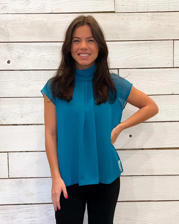 Lola & Sophie Ocean Double Mock Top: Feel beachy-keen in this stylish top with double mock detailing. Turn heads and get compliments!